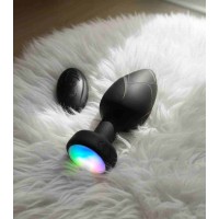 Анальная пробка с вибрацией и подсветкой